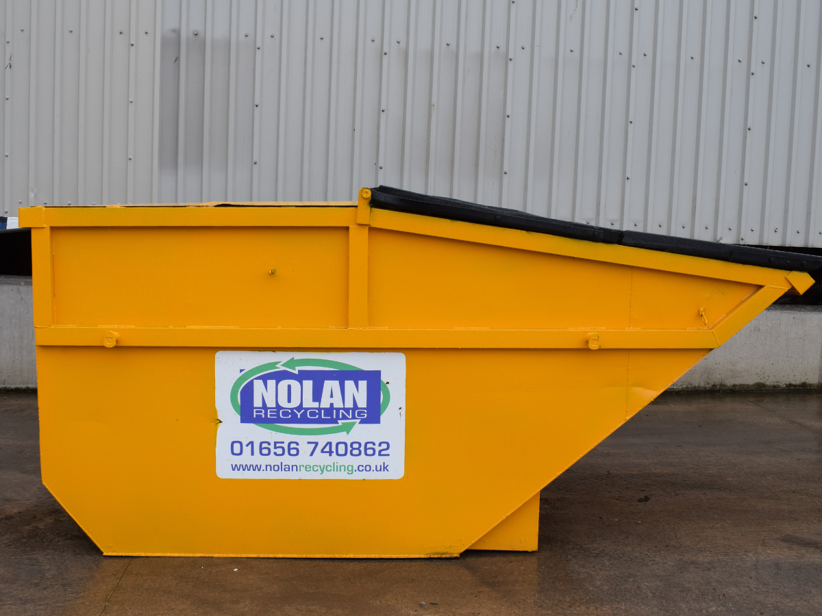 Image of Nolan Recycling Enclosed XL Builders Skip on the yard showing size
